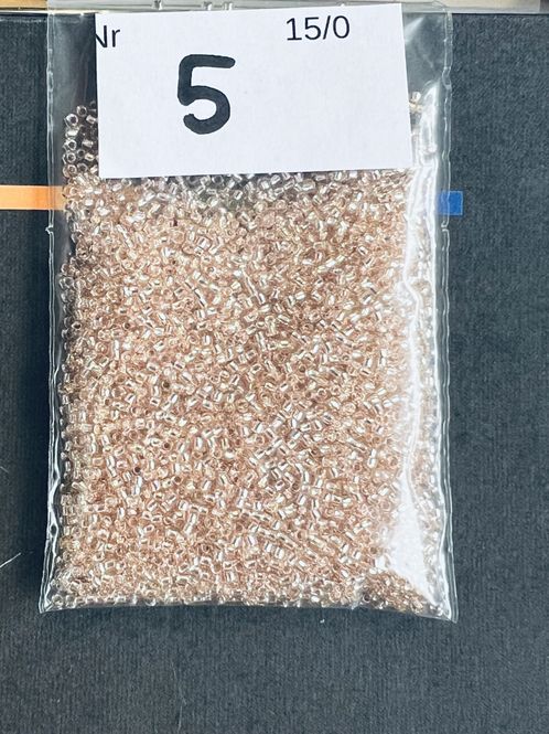 Hovedbilde Mini 5 - Champagne med sølv inni